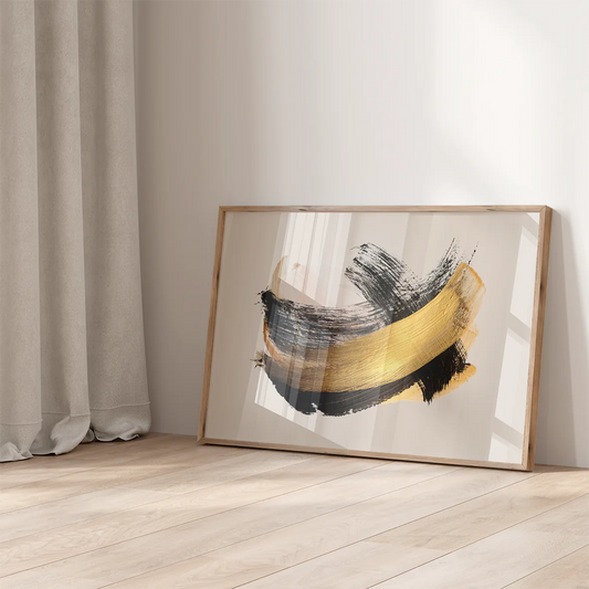 "Abstract wall art featuring bold black and gold brushstrokes