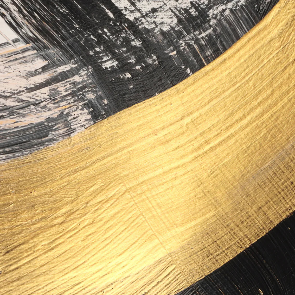 "Abstract wall art featuring bold black and gold brushstrokes