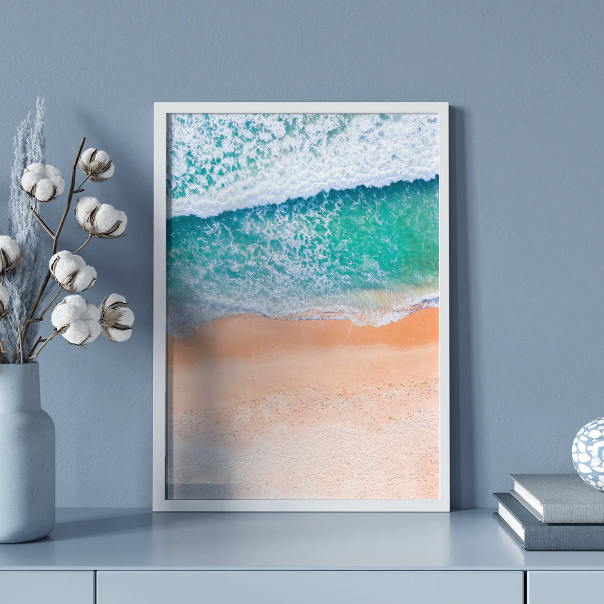 Tranquil beach wall art featuring soft ocean waves on the shore