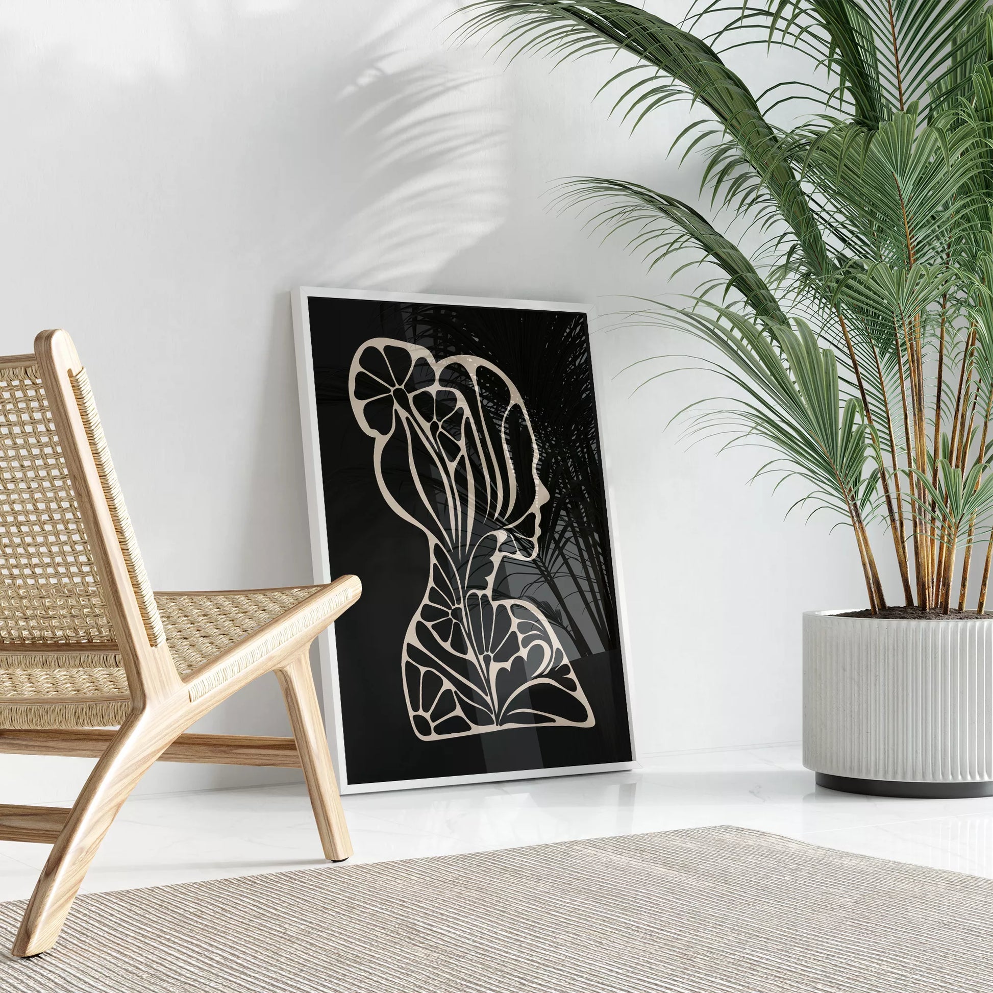 アールヌーボー様式の花柄シルエットアート、黒地に優雅な横顔デザイン