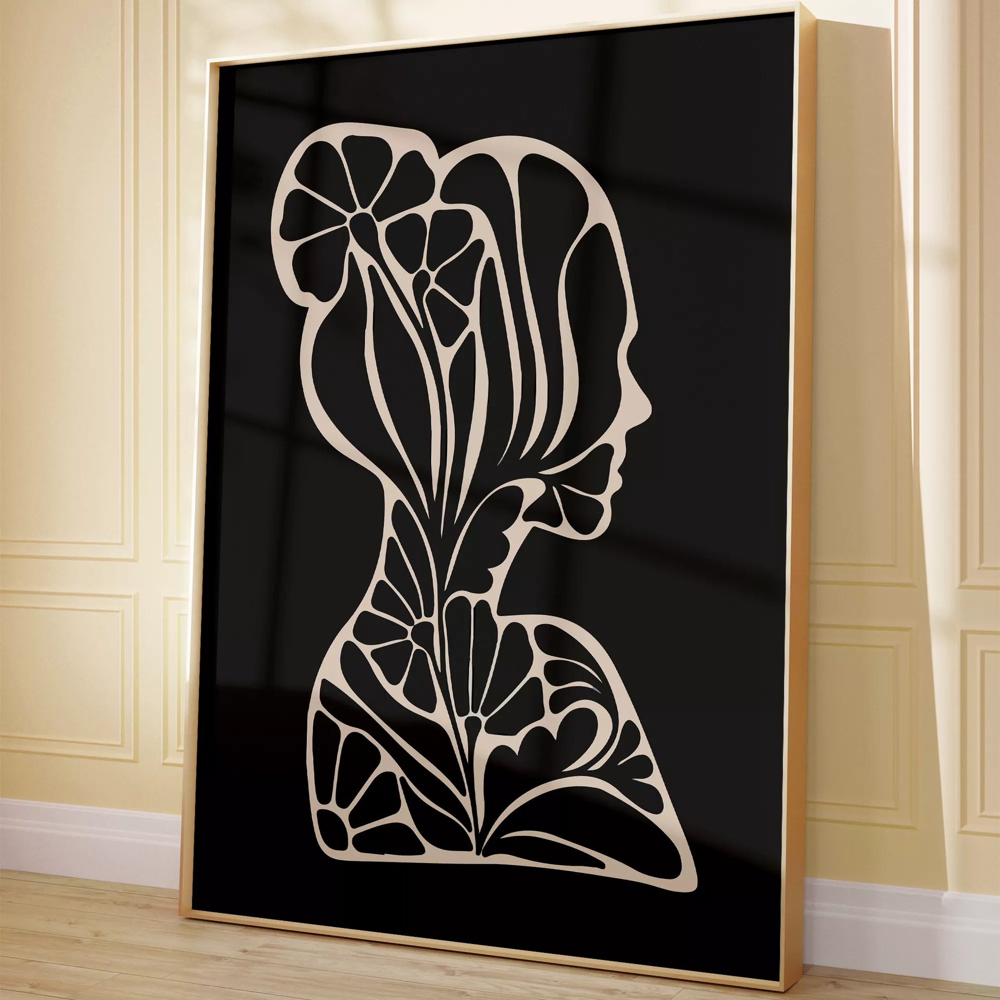 アールヌーボー様式の花柄シルエットアート、黒地に優雅な横顔デザイン