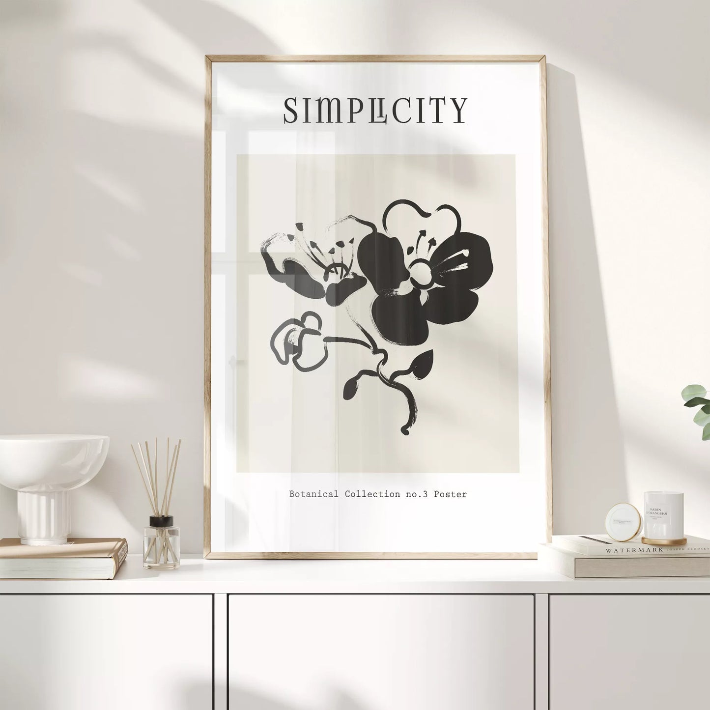 シンプルな筆致で描かれたモノクロの蘭の花のミニマルアート