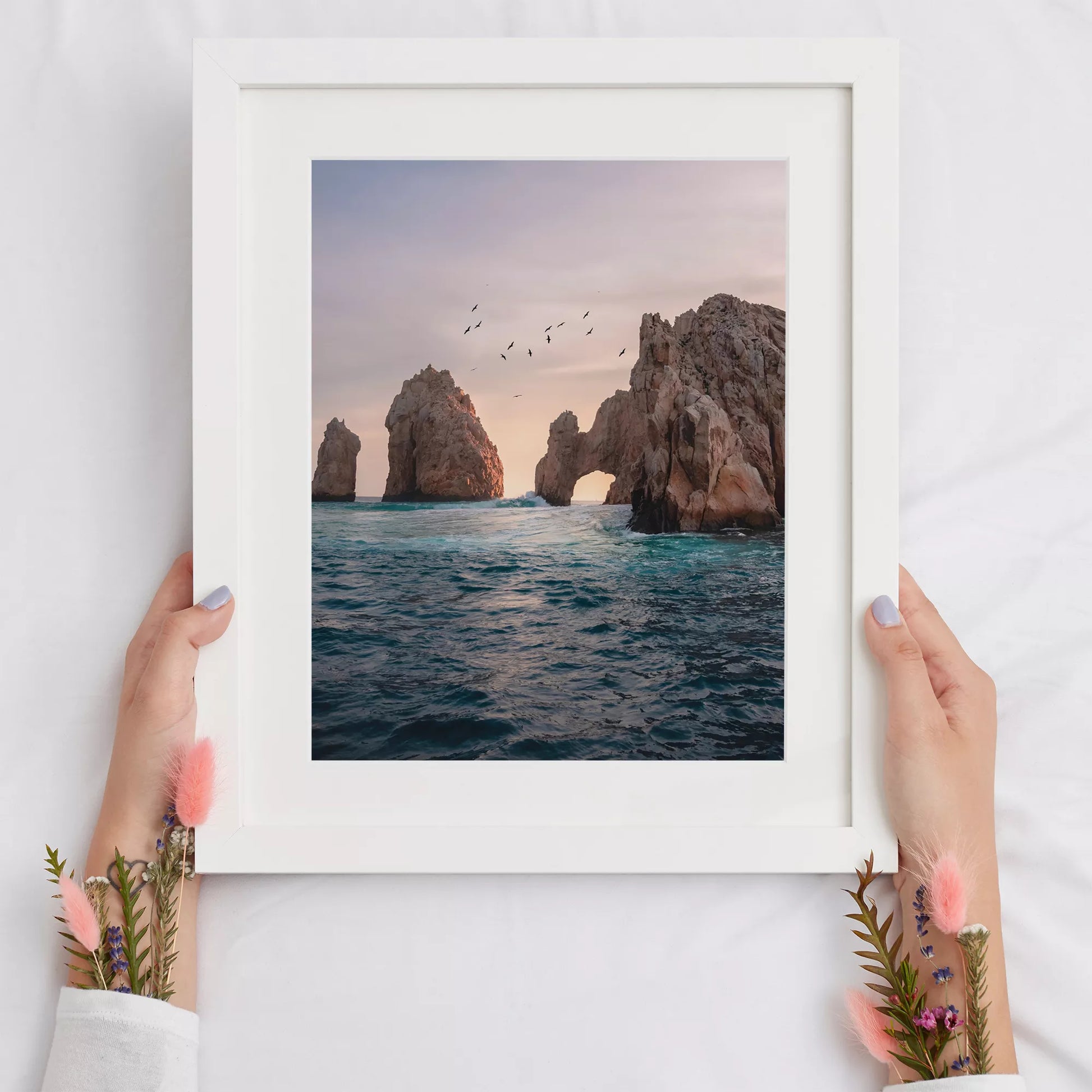 メキシコ・カボサンルーカスの象徴的な岩門と夕暮れの海景色