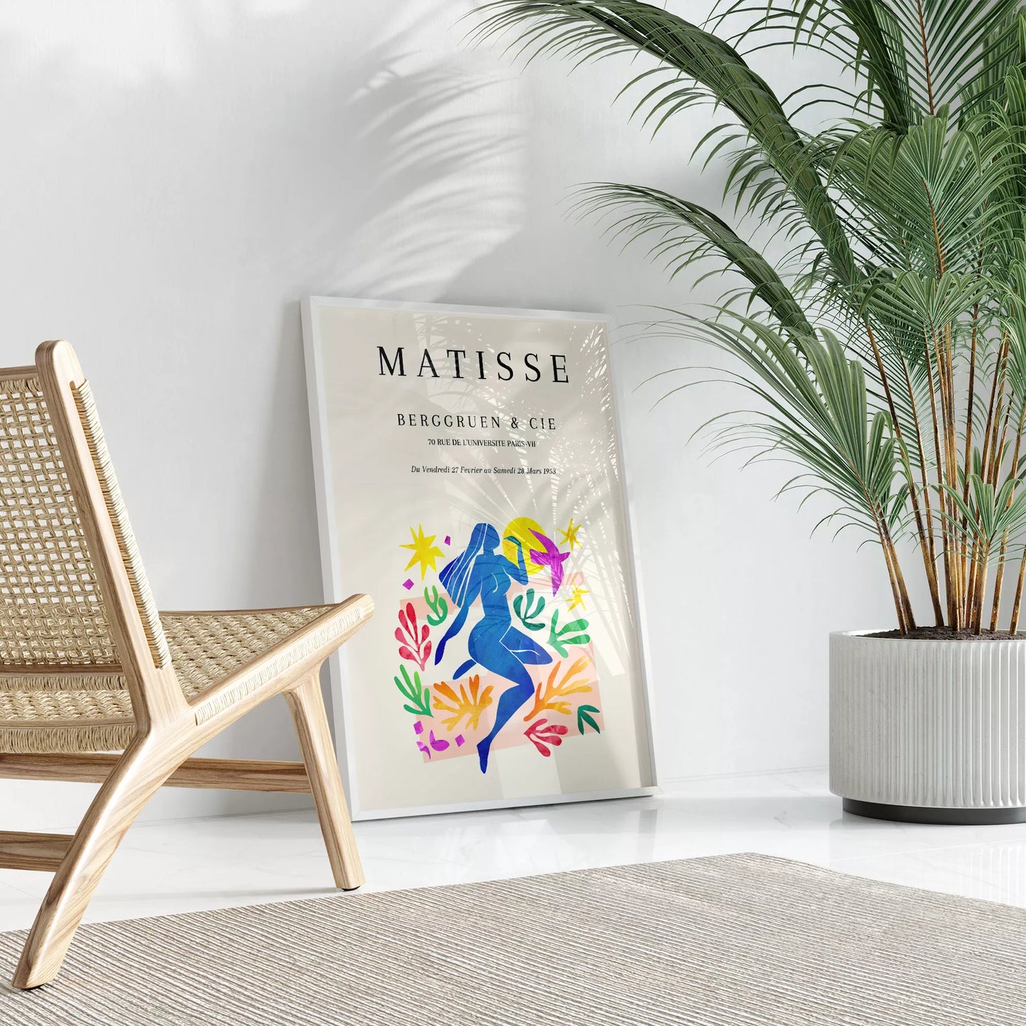 マティス展ポスター、青い人物像と色彩豊かな植物モチーフ