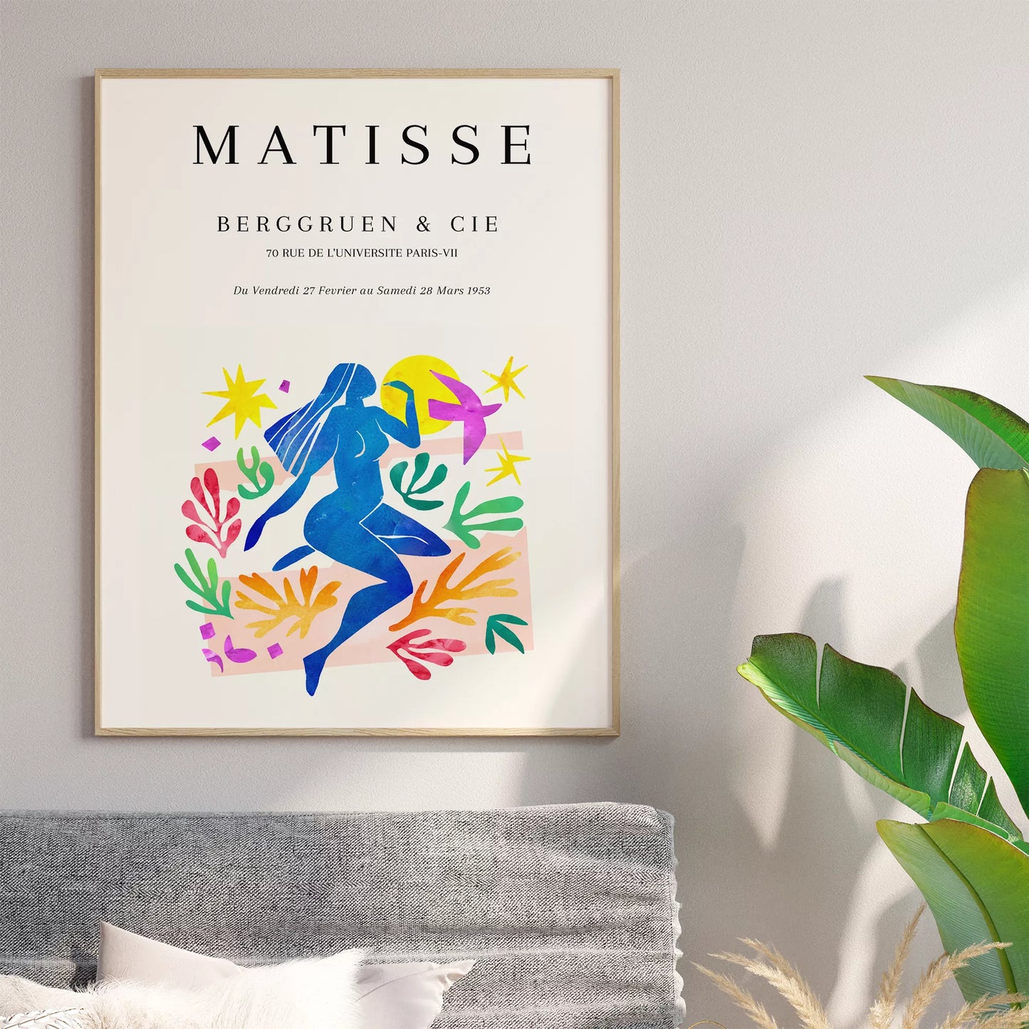 マティス展ポスター、青い人物像と色彩豊かな植物モチーフ