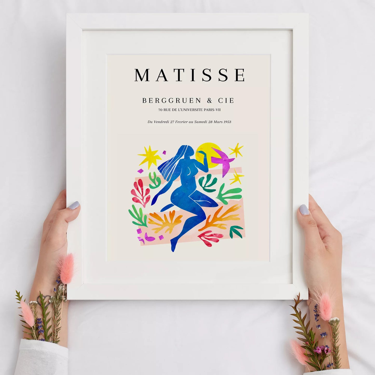 マティス展ポスター、青い人物像と色彩豊かな植物モチーフ