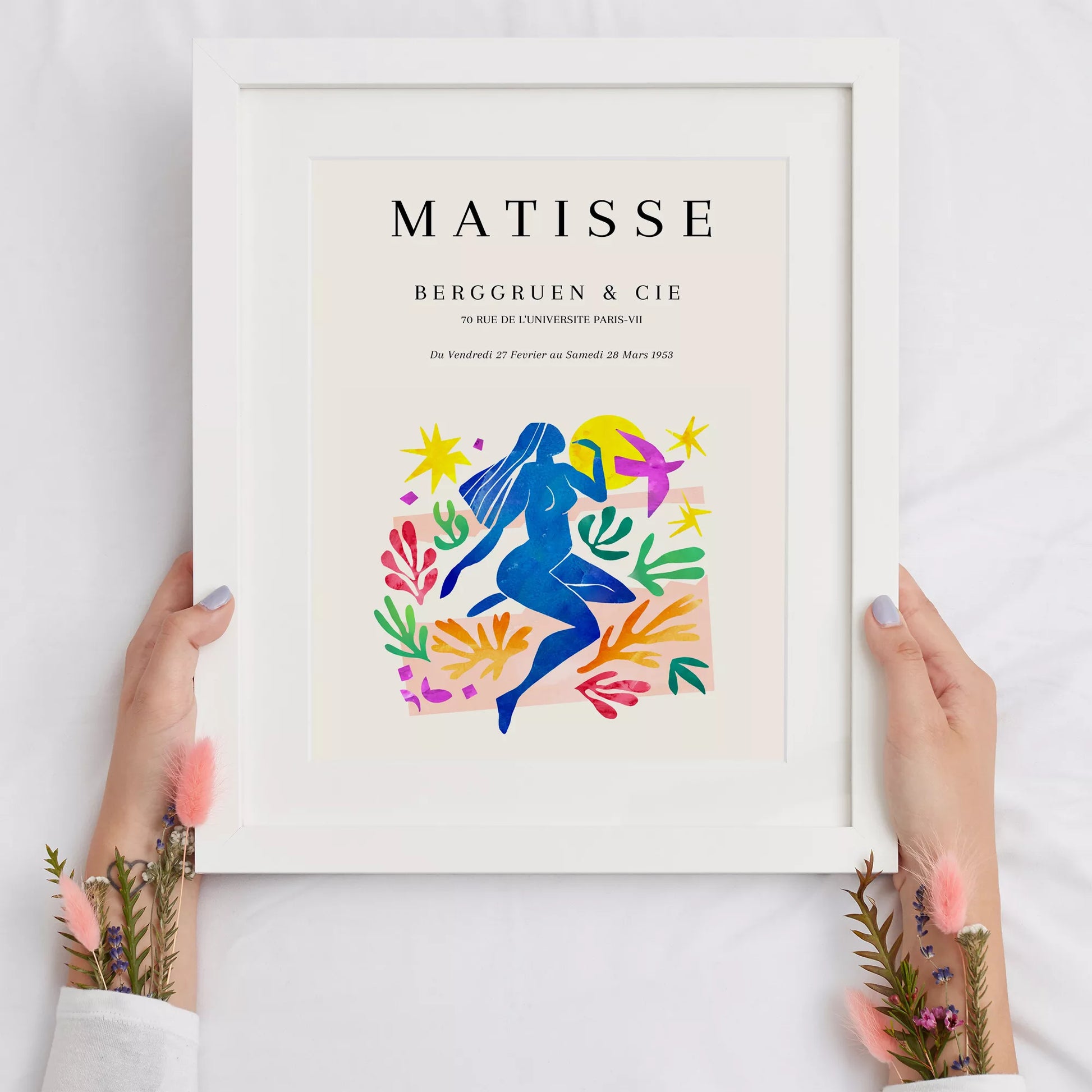 マティス展ポスター、青い人物像と色彩豊かな植物モチーフ