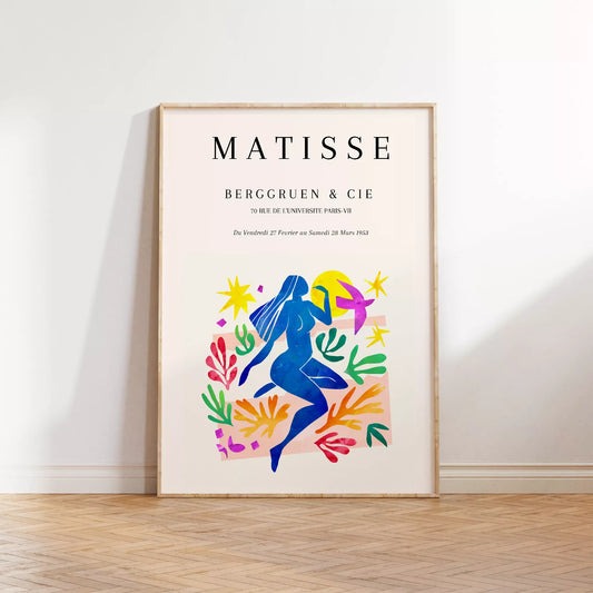 マティス展ポスター、青い人物像と色彩豊かな植物モチーフ