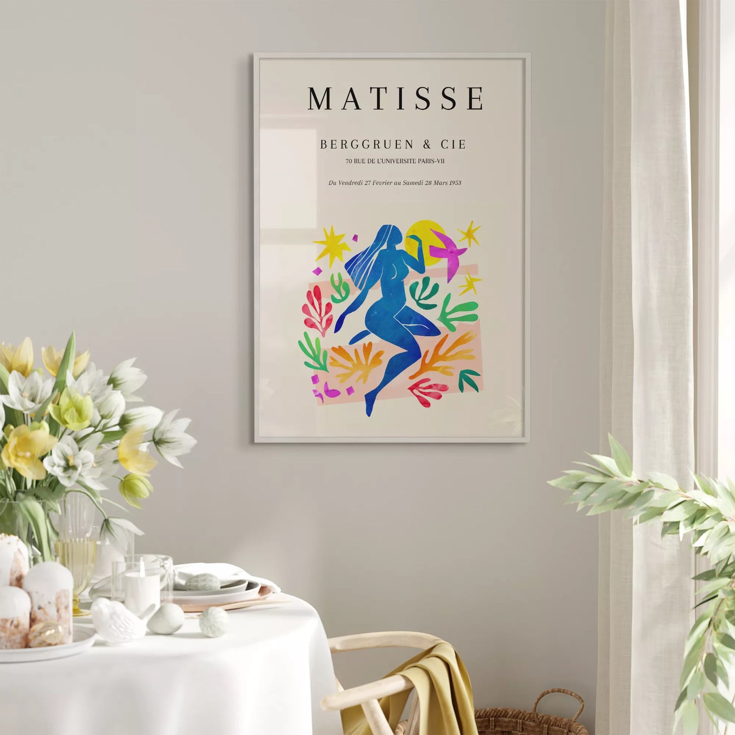 マティス展ポスター、青い人物像と色彩豊かな植物モチーフ