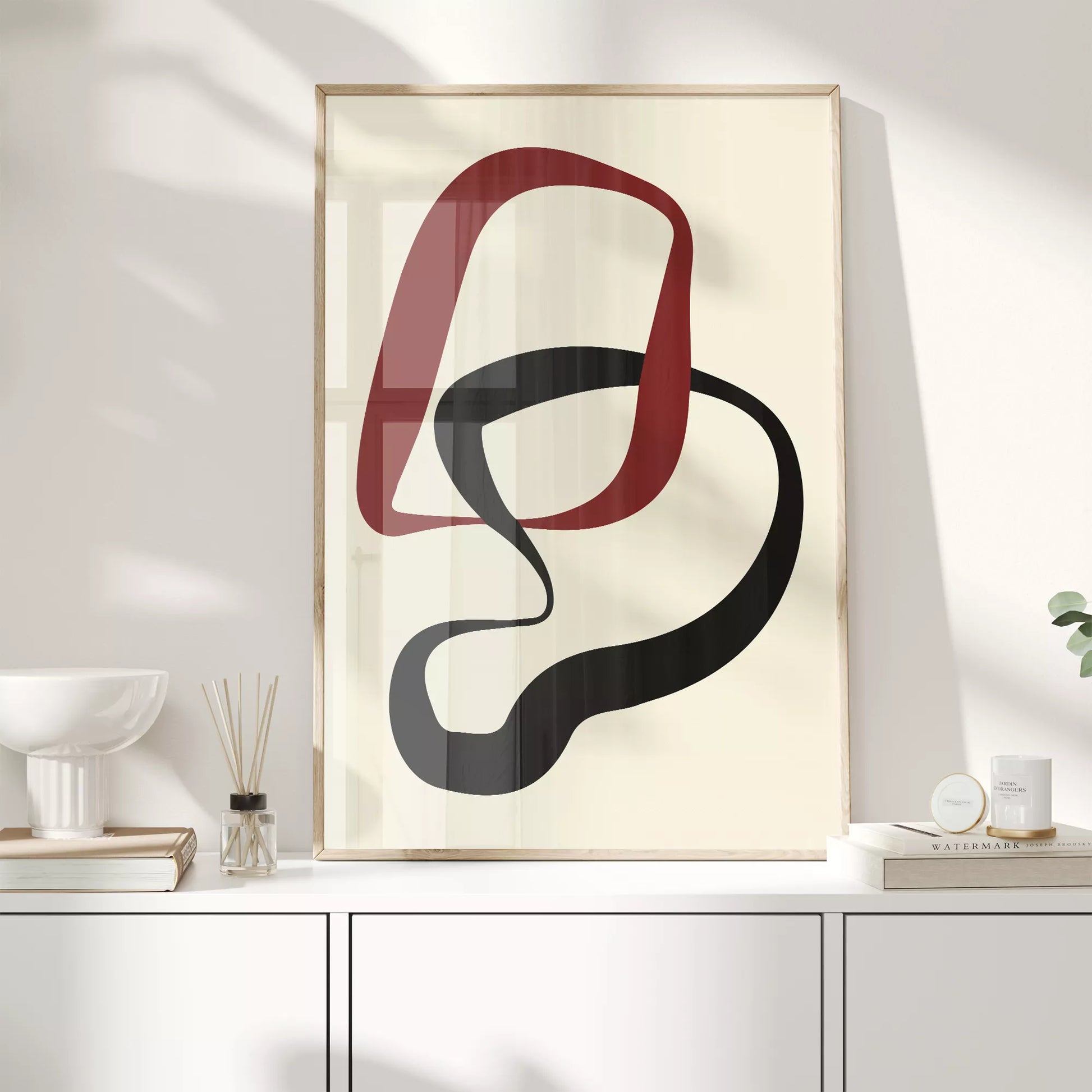 赤と黒の曲線が織りなすモダンな抽象アート