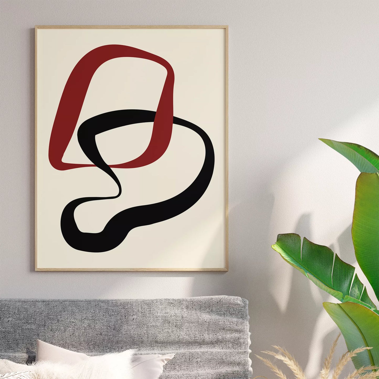 赤と黒の曲線が織りなすモダンな抽象アート