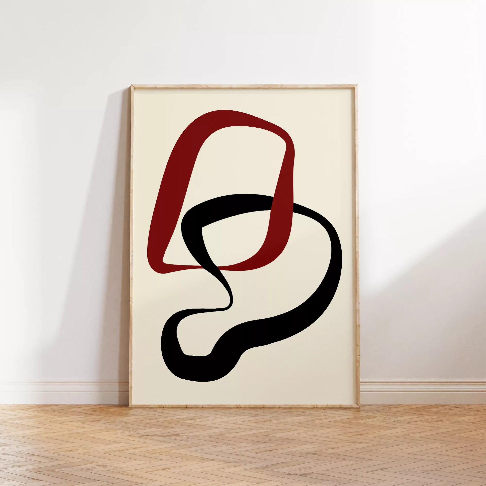 赤と黒の曲線が織りなすモダンな抽象アート