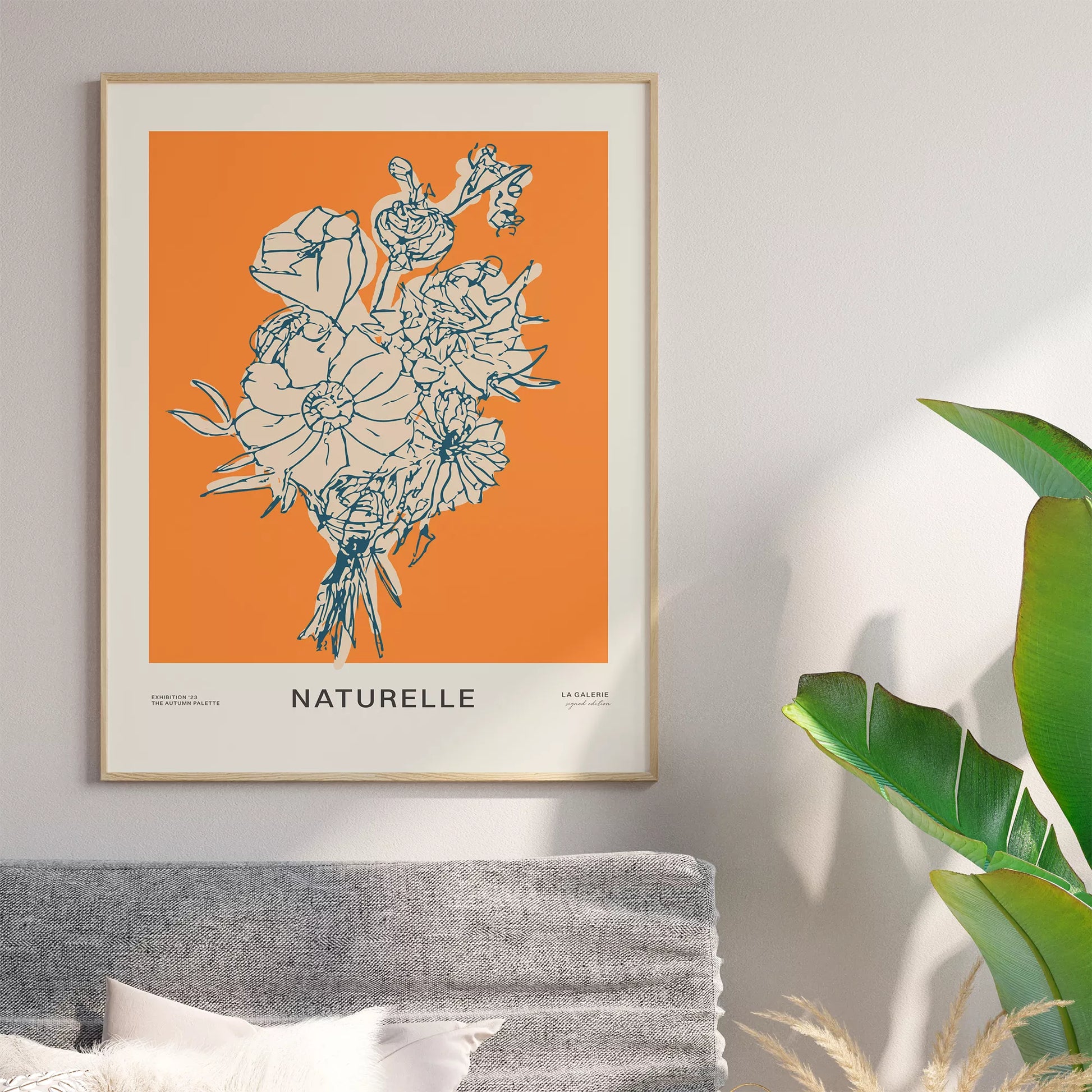 オレンジ背景にモダンな線画で描かれた花束アート