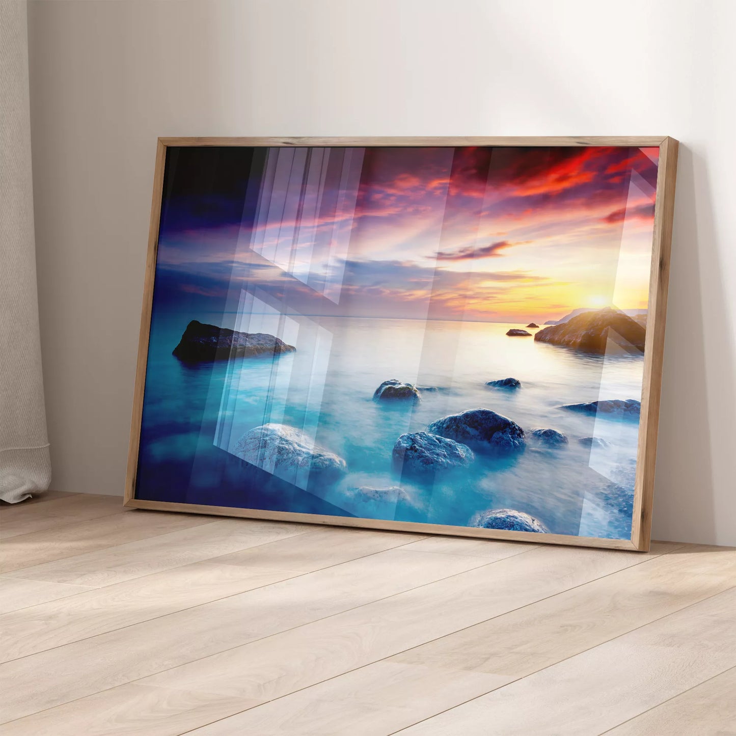 夕暮れの海岸に佇む岩々と神秘的なターコイズブルーの海景色