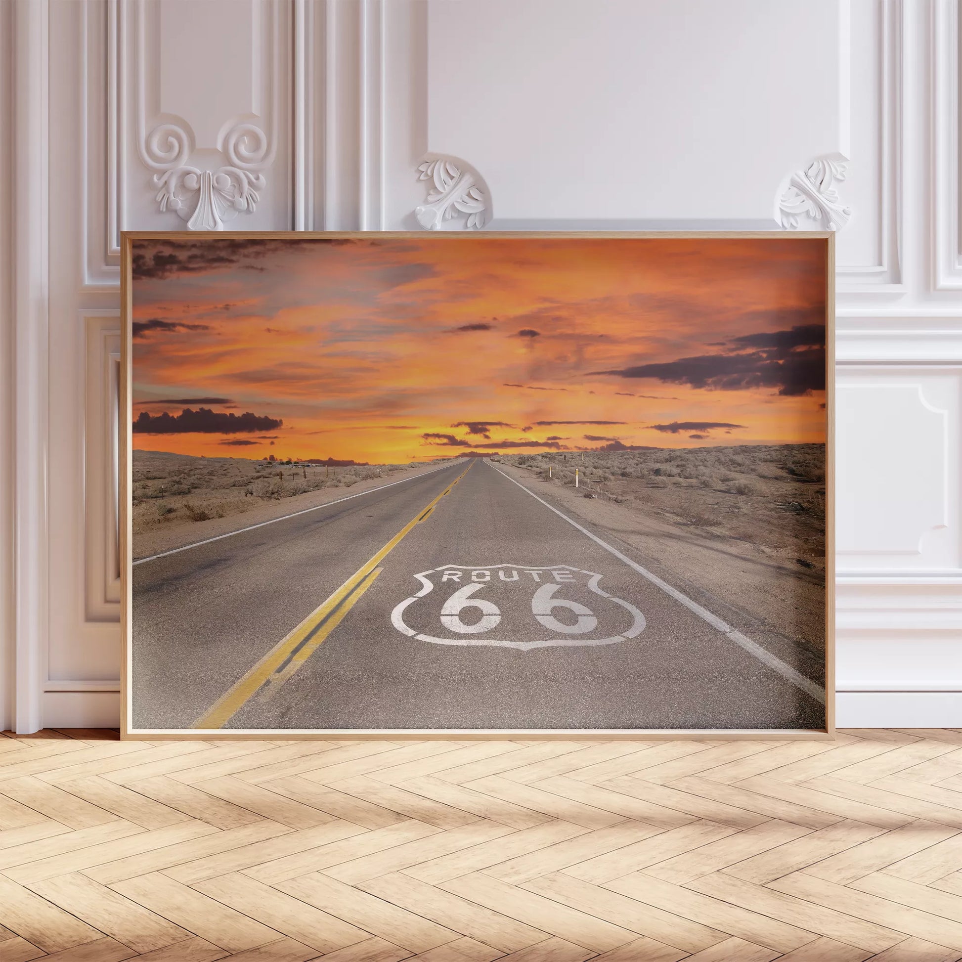 ルート66の象徴的な道路と燃えるような夕焼けの風景アート