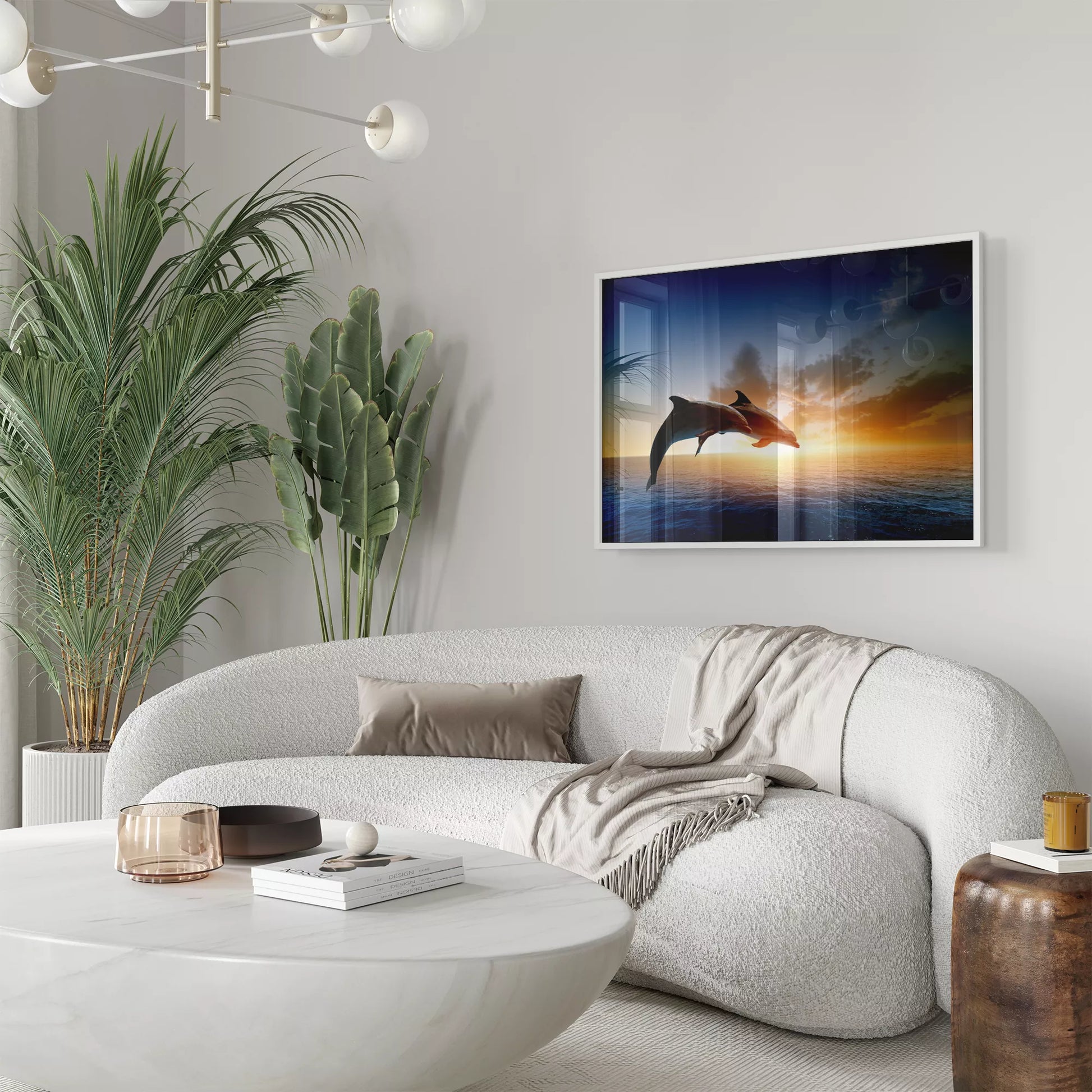 夕陽に向かってジャンプする2頭のイルカのシルエット