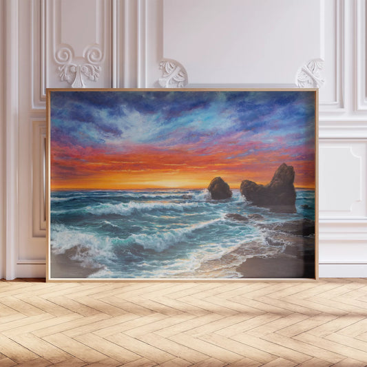 夕焼けの空と荒波が打ち寄せる海岸の風景画