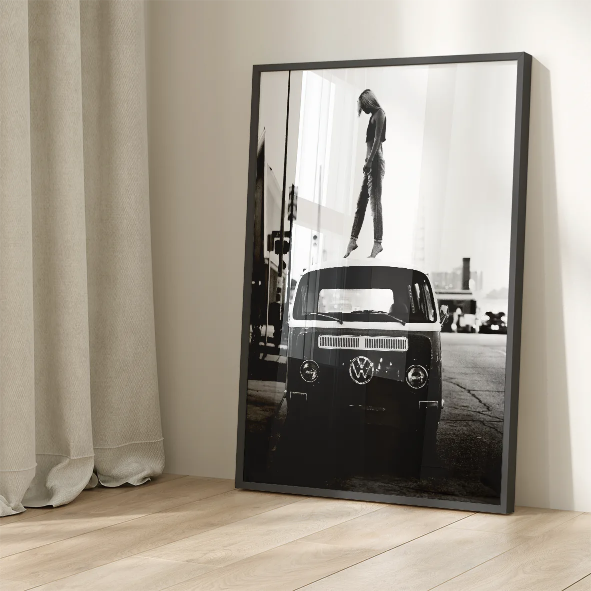 Retro-inspired wall print featuring a person atop a classic VW van