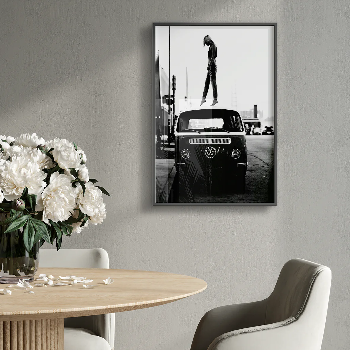 Retro-inspired wall print featuring a person atop a classic VW van