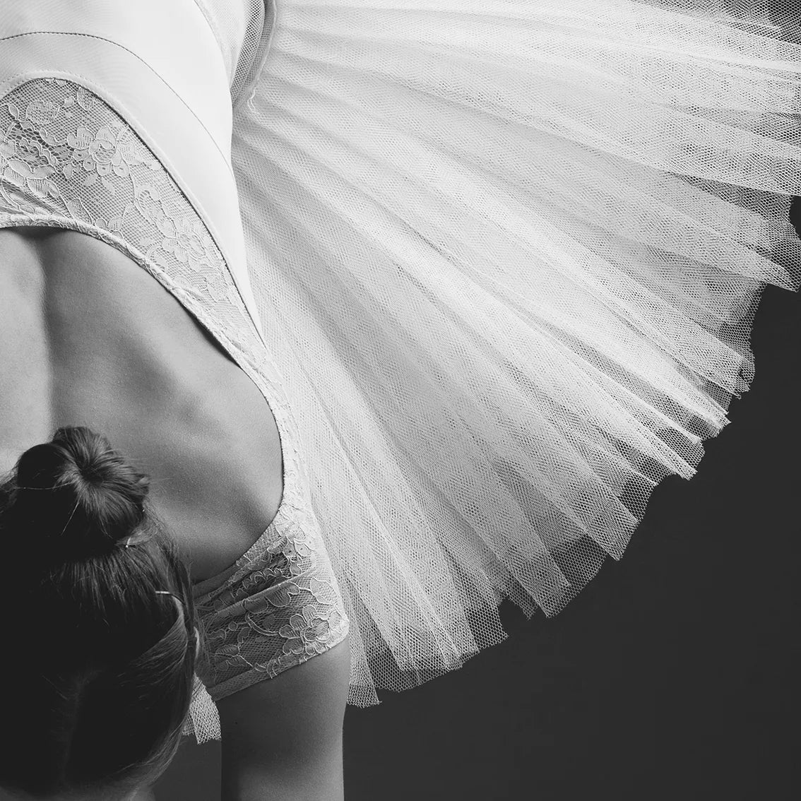 Elegant ballerina captured in a serene, graceful pose for sophisticated dance-themed decor