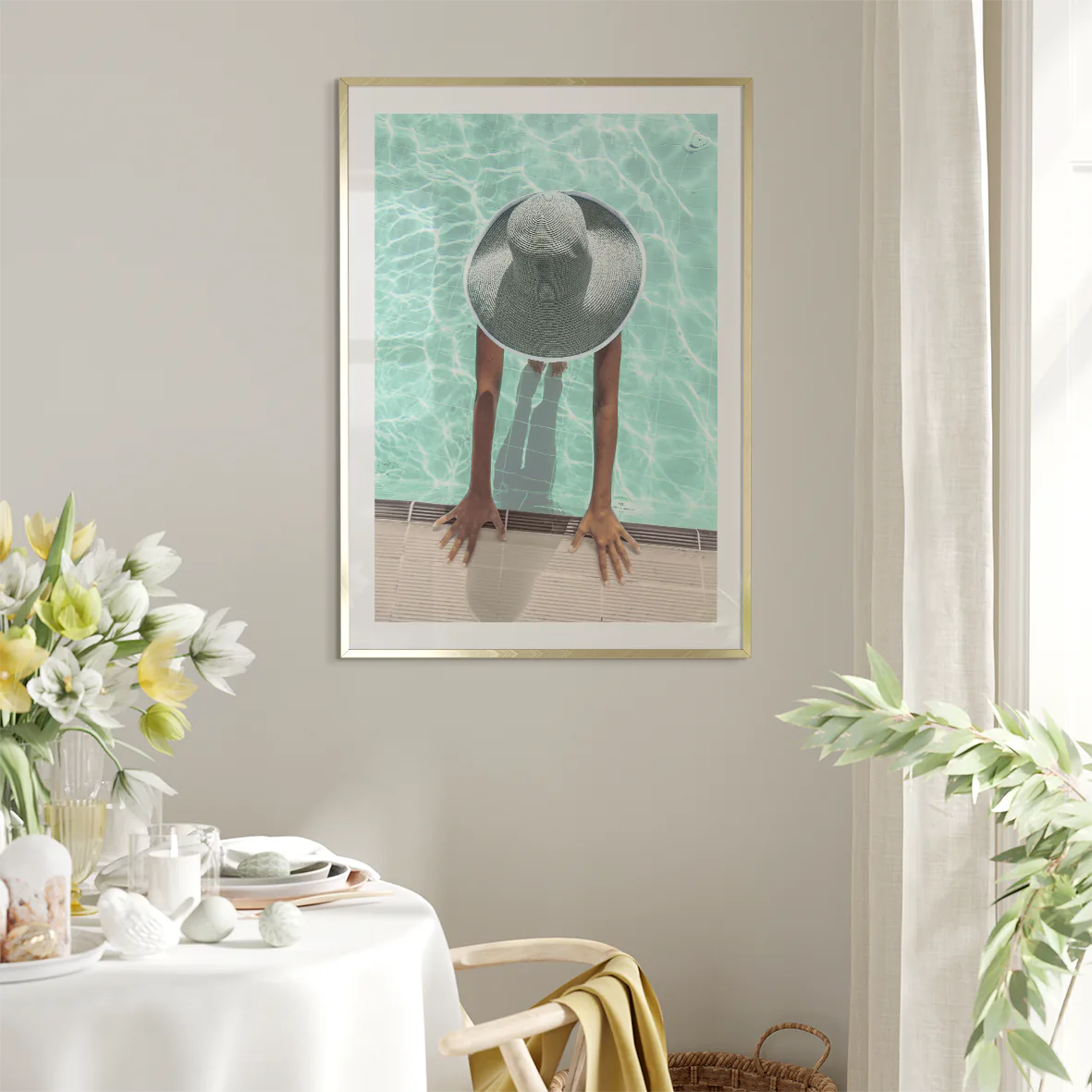 Elegant wall art showcasing a tranquil pool scene with a sunhat-clad figure,