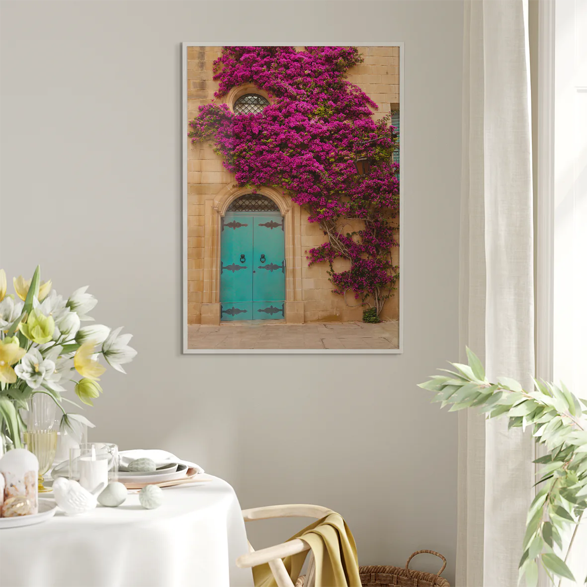 Turquoise door with vibrant purple flowers on a building facade