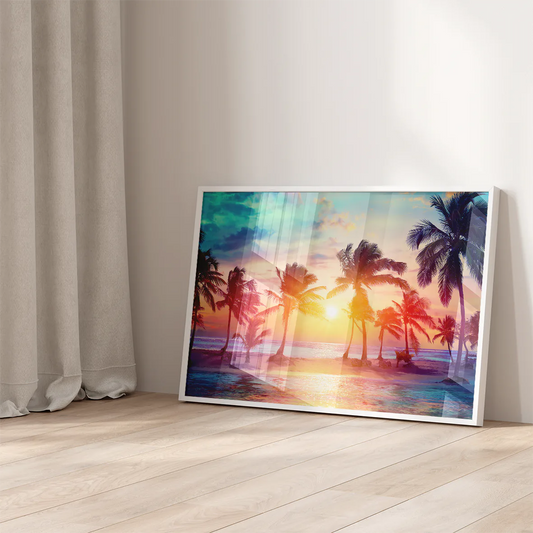 Wall art featuring a sunlit beach with palm trees during a vivid sunset