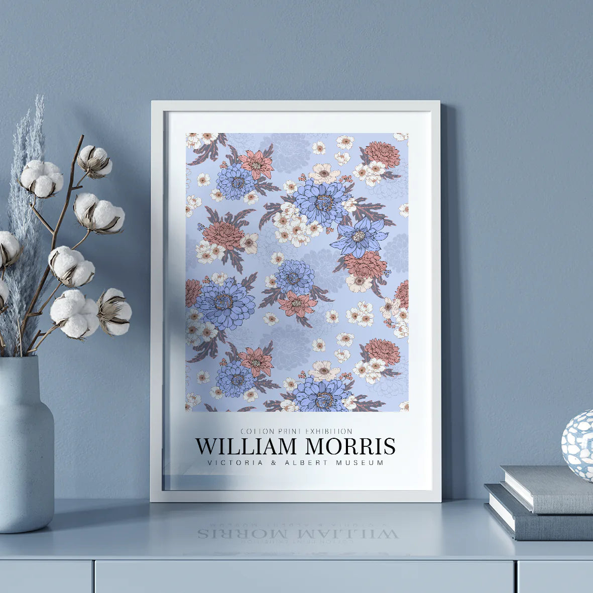 William Morris exhibition cotton print with pastel flowers on a blue background