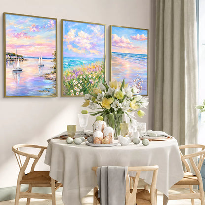 花と海、ヨットを描いた３枚の風景ポスターを明るいダイニングに飾ったイメージ
