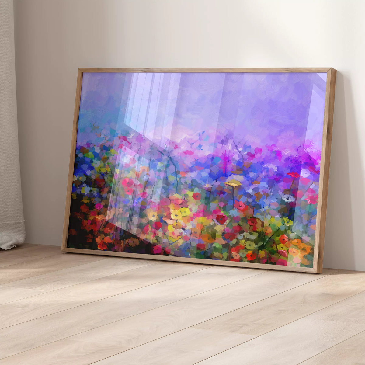 窓からの光が映る壁際に立て掛けた、パープルの花畑のポスター